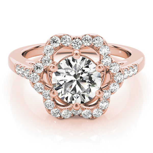 Direct overhead view of a rose gold vintage flower petal halo diamond ring