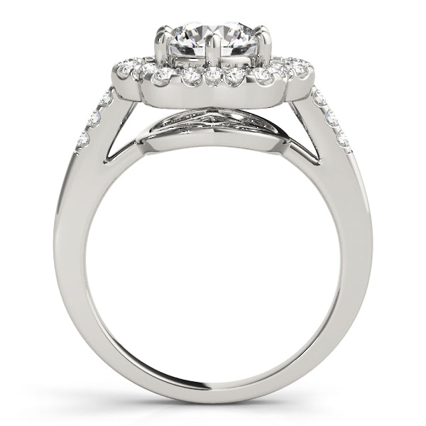 Tilted vertical view of a white gold vintage flower ring