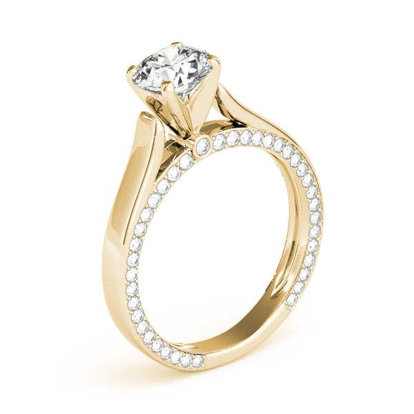 Side view of 14k yellow gold solitaire ring revealing a full inner rim of pavé diamonds.