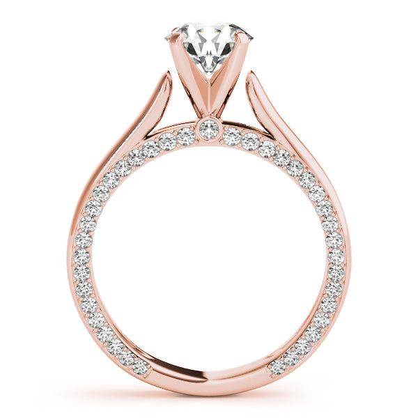 Straight side shot of a rose gold diamond ring displaying the secret under-halo layout.
