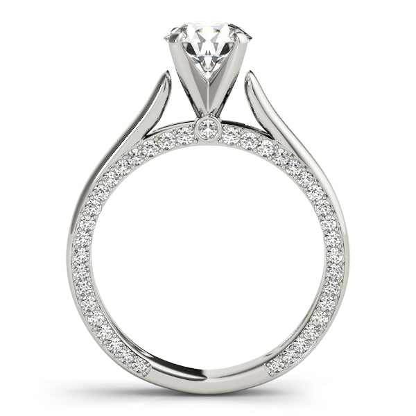 Pure side profile of a white gold solitaire ring showcasing the complete inner pavé diamond rim.