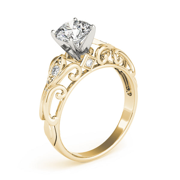 Perspective view of 14k yellow gold filigree ring highlighting diamond side stones.