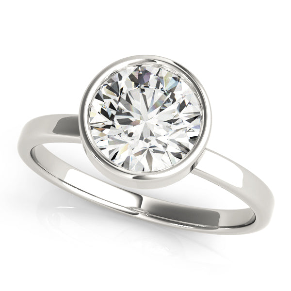 Top view of 1.25 carat round lab grown diamond in white gold bezel setting