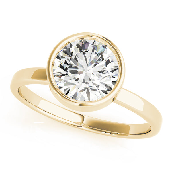Side angle view of round lab grown diamond engagement ring in 14K yellow gold