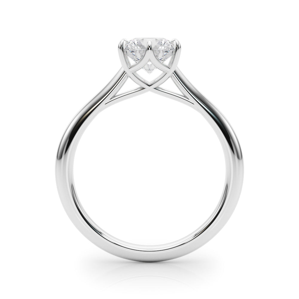 Side profile showing the 6-prong setting of a white gold diamond ring