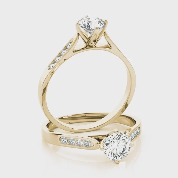 Round Brilliant Cut Diamond Solitaire with Accent Stones