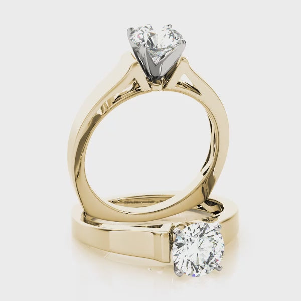 The Perfect Proposal Ring: Classic Round Cut Diamond Cathedral Solitaire