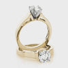 The Perfect Proposal Ring: Classic Round Cut Diamond Cathedral Solitaire
