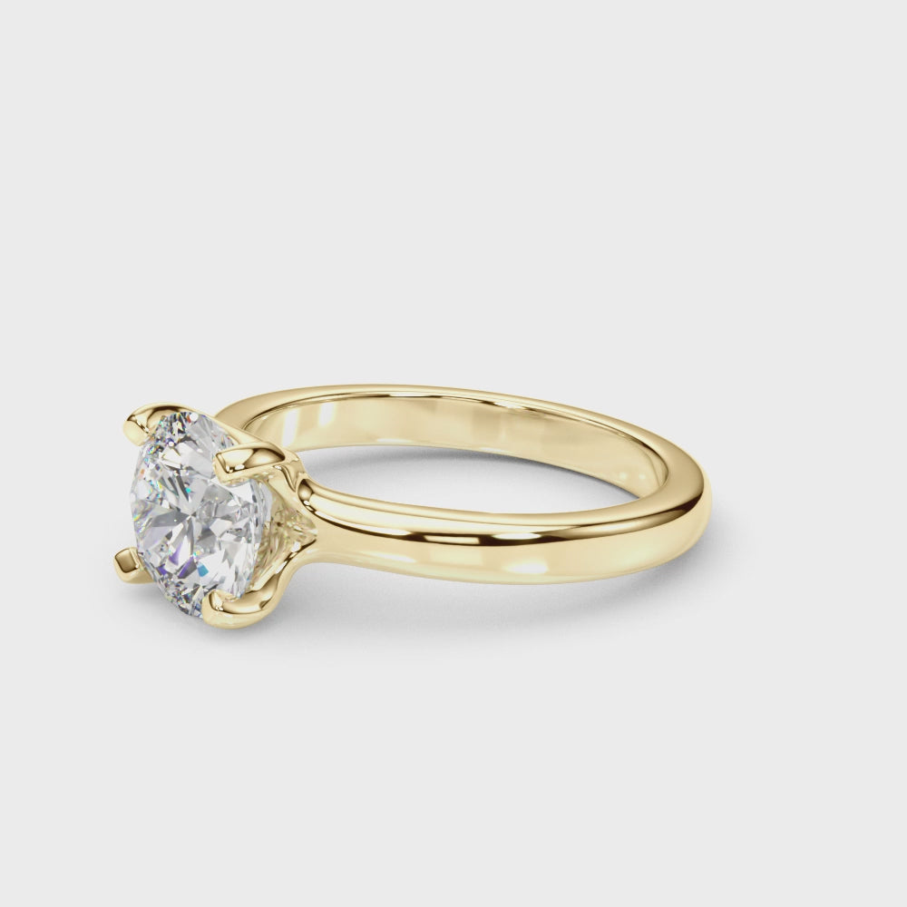 High-definition 360 view of a VS-F lab grown diamond solitaire ring in 14K yellow gold.