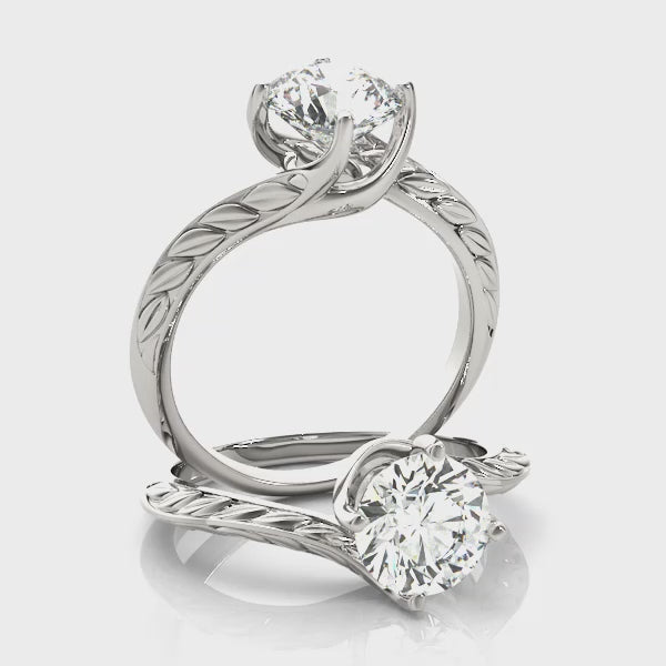 360-degree rotation video of the white gold designer bypass ring highlighting the unique prong and band work.