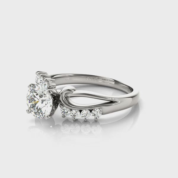 Creative perspective display showing the top and side curves of the 14K white gold diamond swirl ring.