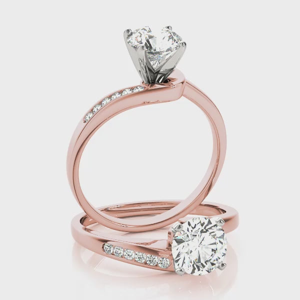 14K rose gold diamond spiral ring.