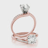 14K rose gold diamond spiral ring.