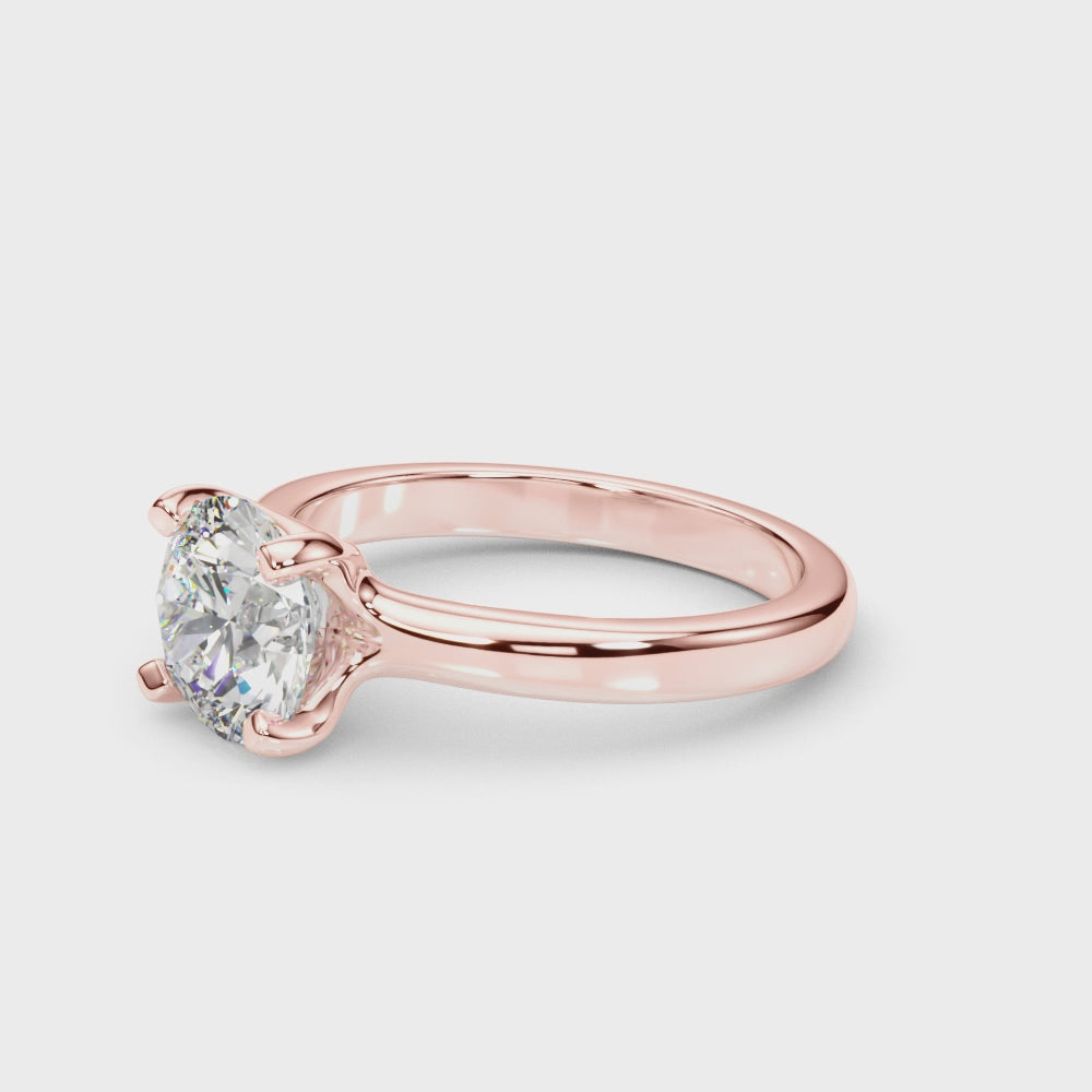 360-degree rotation of a stunning lab grown diamond engagement ring in 14K rose gold.