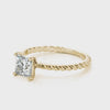 High-definition rotating display of 14k yellow gold braided rope shank princess cut solitaire ring