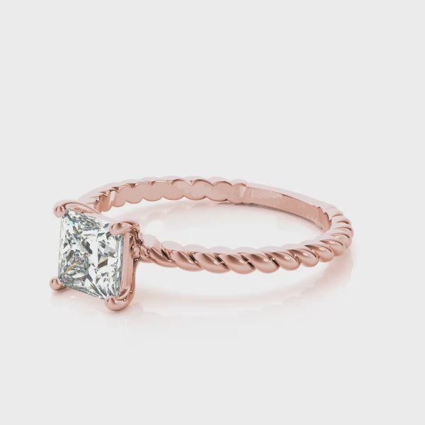 Elegant video showcase of princess cut diamond ring on a rose gold twisted rope band