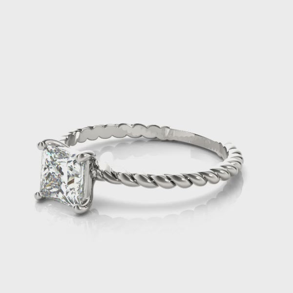 360-degree turntable video of white gold princess cut lab grown diamond ring with twisted rope band