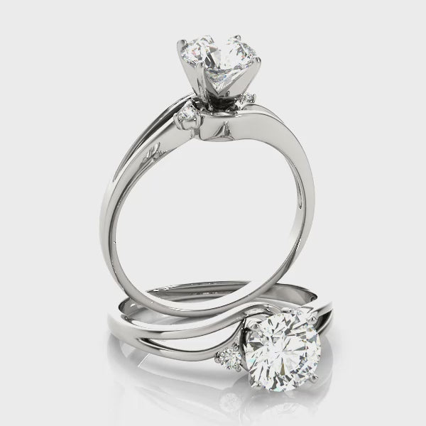 side views of the 14K white gold round lab diamond bypass ring.