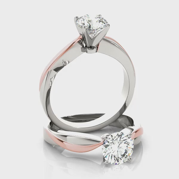 Stunning 360 rotation video of the two-tone 14K rose and white gold crossover shank diamond ring.