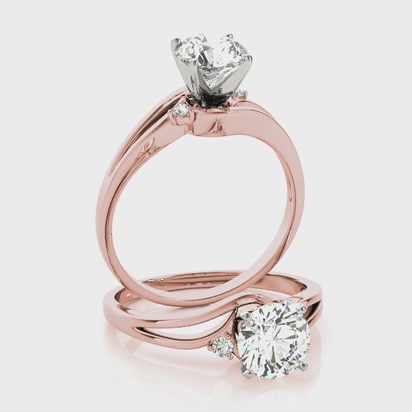 the elegant fluid curves of the 14K rose gold diamond wave ring.