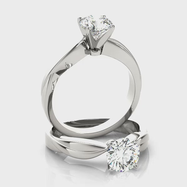 360-degree studio display video of the 14K white gold round diamond bypass solitaire engagement ring.