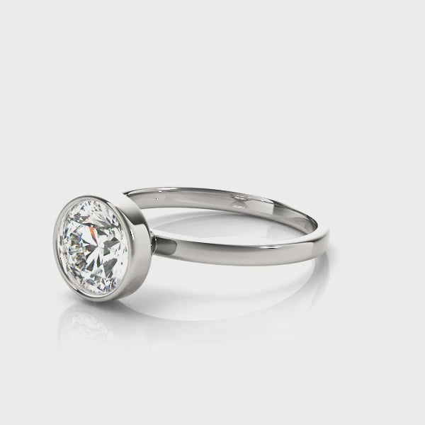 360-degree rotation video of 14K white gold bezel set lab diamond ring