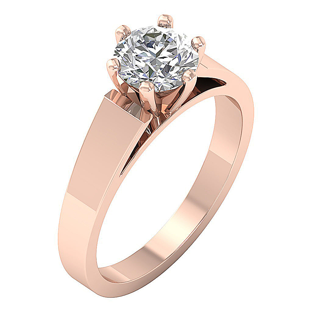 Romantic 14K rose gold engagement ring with a massive solitaire diamond.