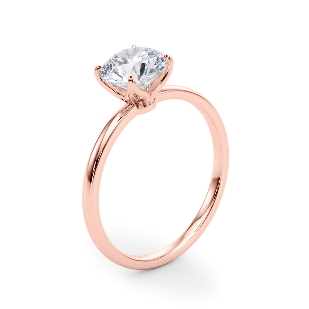Side profile of rose gold solitaire ring with a decorative petal basket holding a round lab diamond.