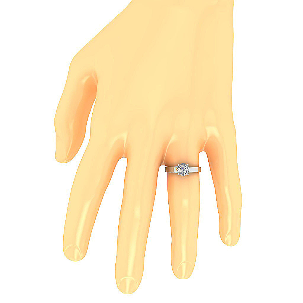 Tilted view of a slim 14K gold band with a large center stone