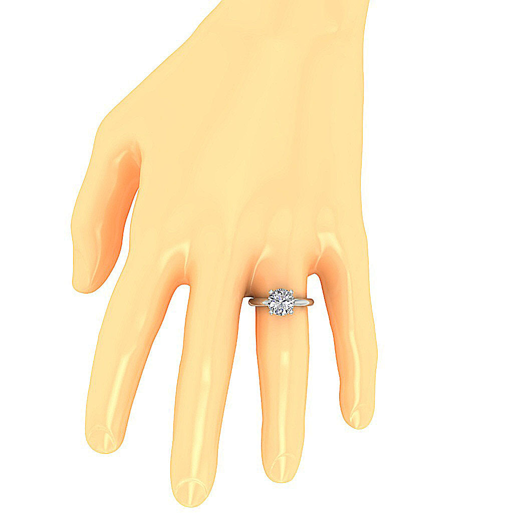 Lifestyle hand shot showing the impressive size of a 4.00 carat 4-prong solitaire ring.