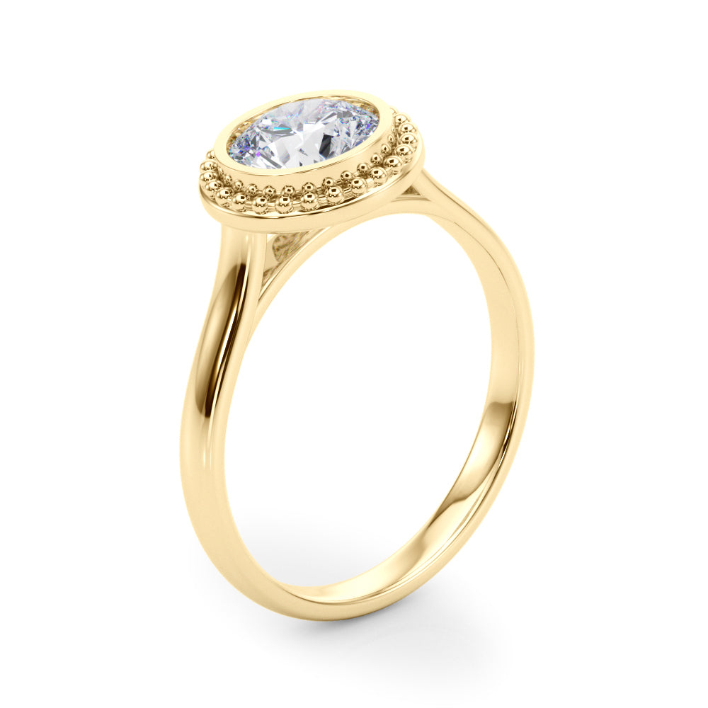 Angled shot of 14K gold ring with a bezel-set round lab grown diamond