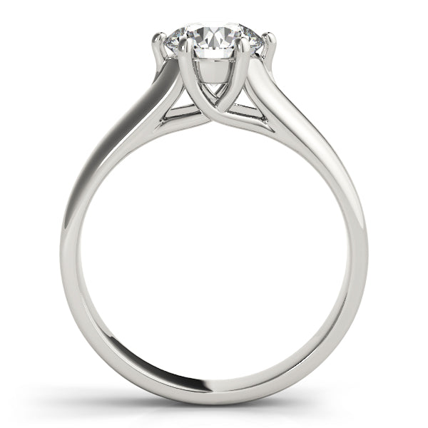 Side profile of the white gold ring showing the unique artistic design at the base of the 6 prongs.