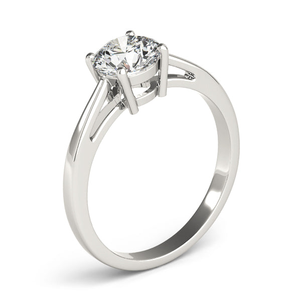 Side profile of the white gold ring showing the elegant cathedral setting and secure prongs.