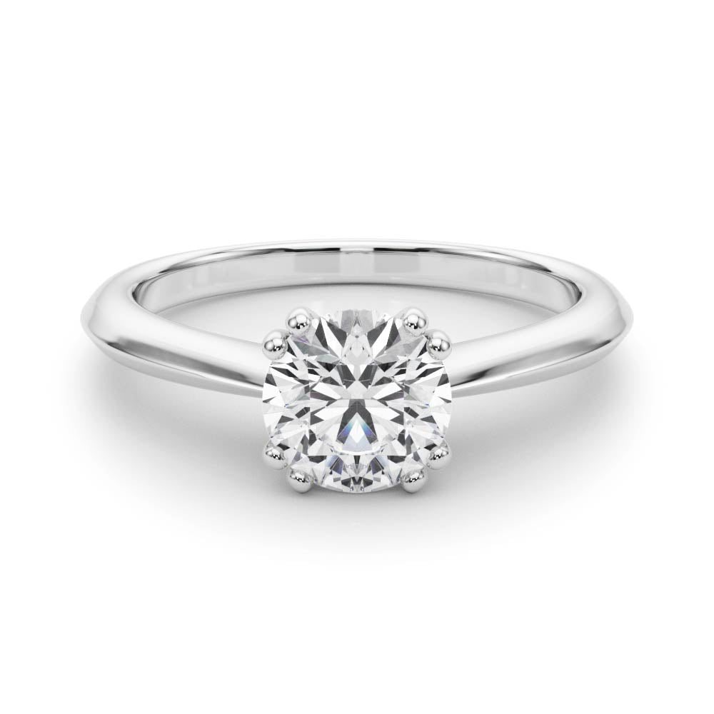 Top view of a VS F round lab grown diamond held by secure double prongs in a 14K white gold 