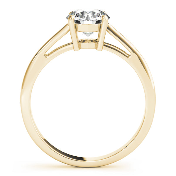 Side angle of a 14K yellow gold solitaire ring with a thick modern band and VS-F lab grown diamond.