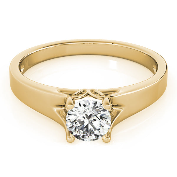 14K yellow gold solitaire ring showing the intricate handcrafted bridge design under the center diamond.