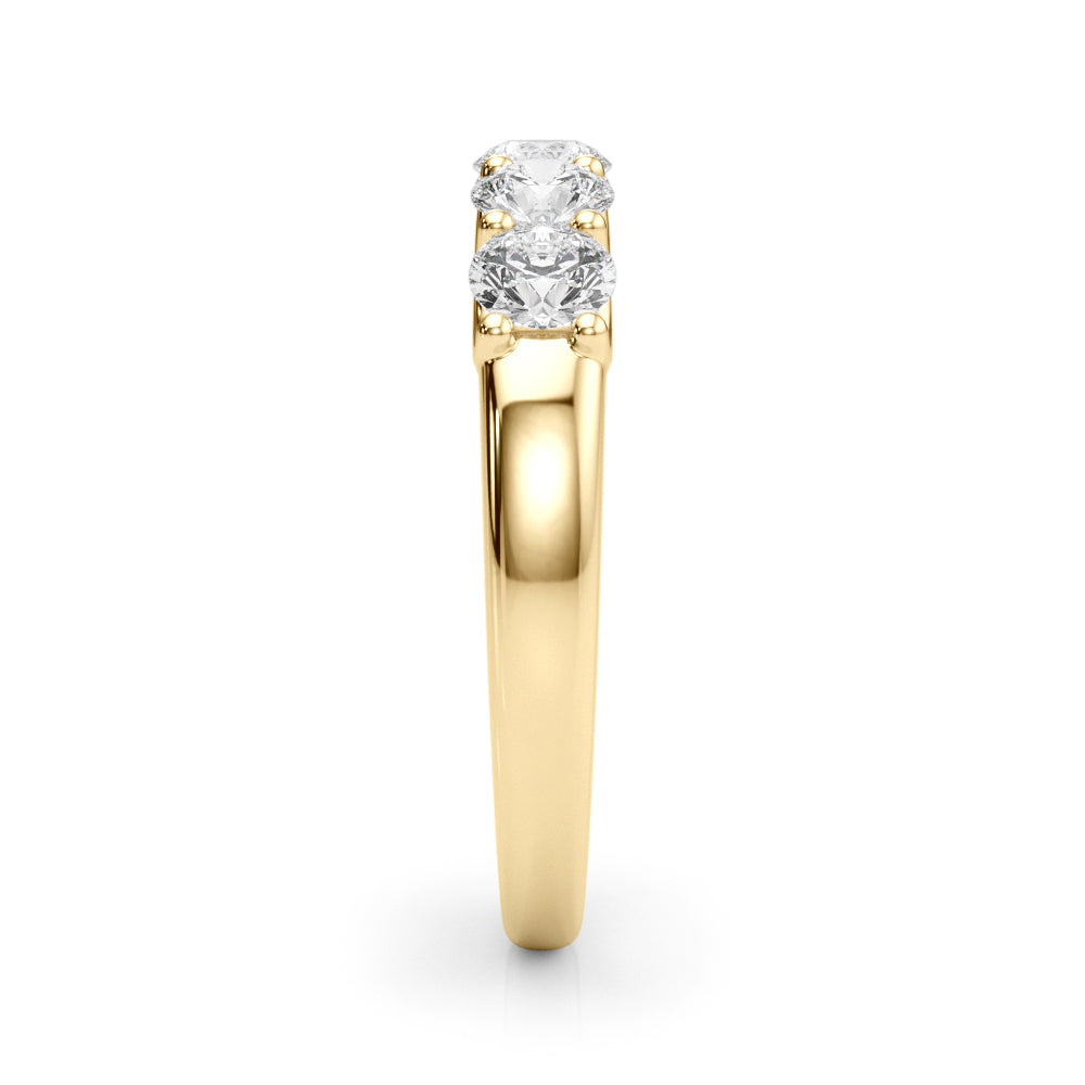 Close-up of U-shape shared prong setting in 14K yellow gold diamond band